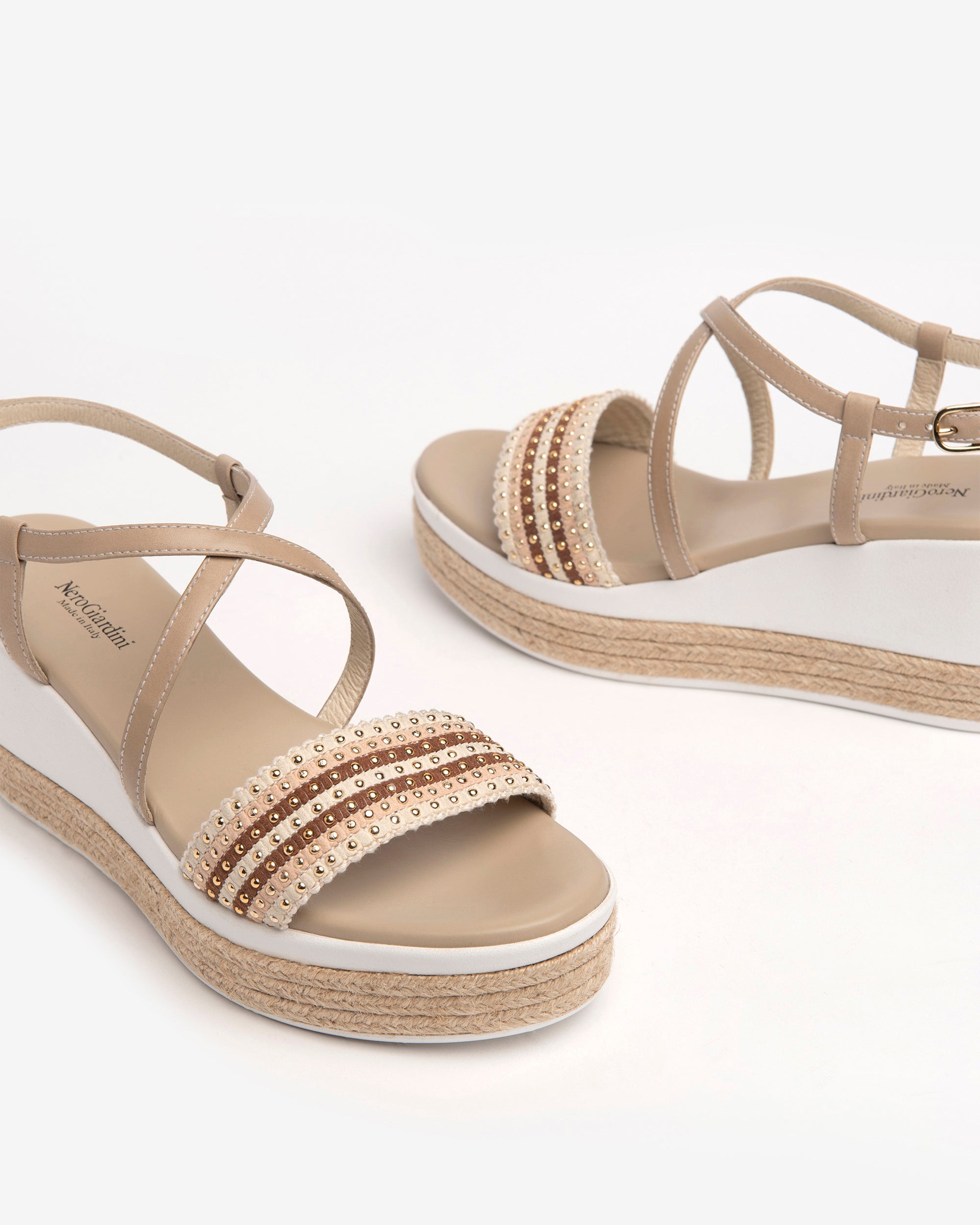 Nero Giardini Sandals cuir compensée cloutée femme