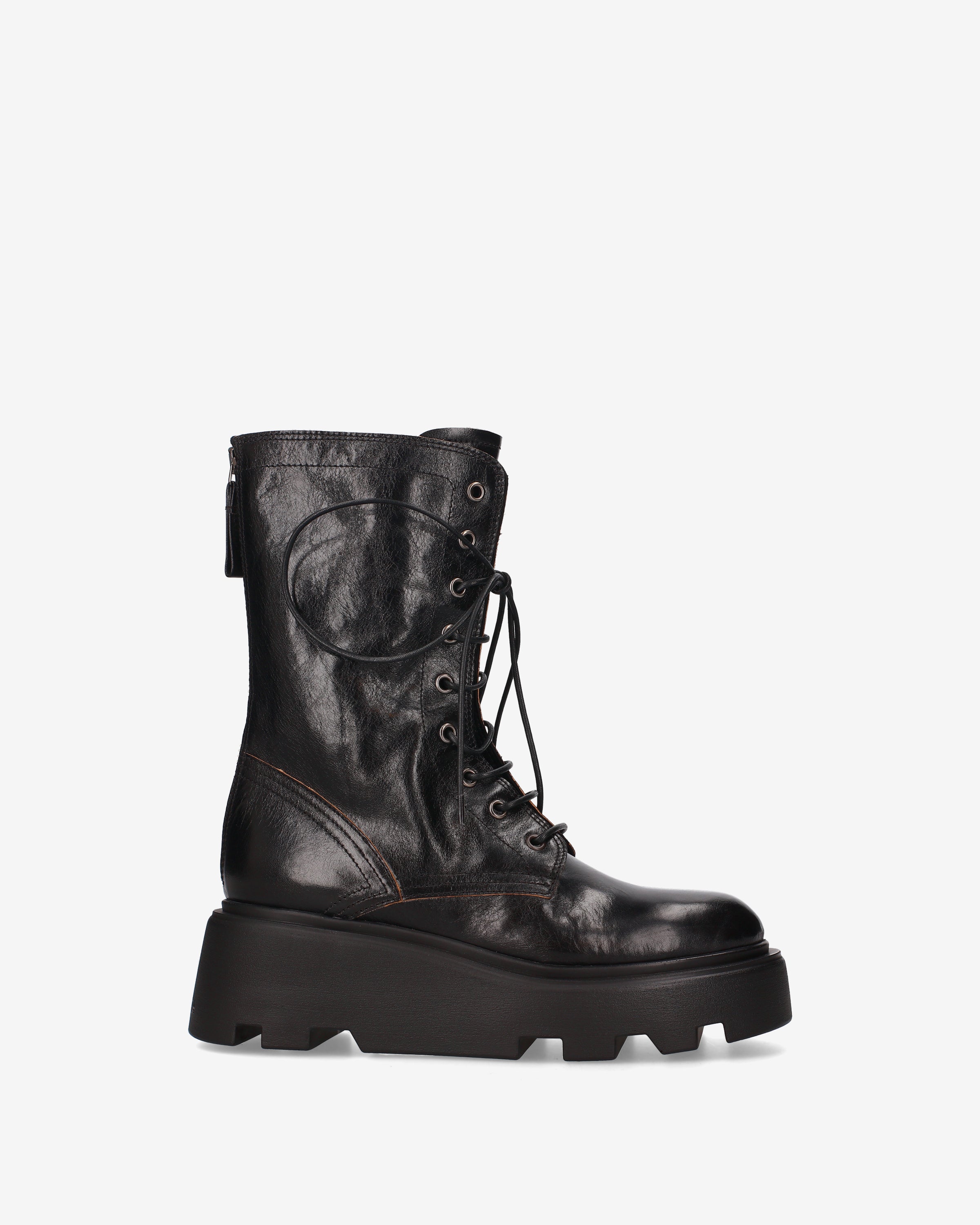 Premiata mocassins femme cuir noir semelle crantée