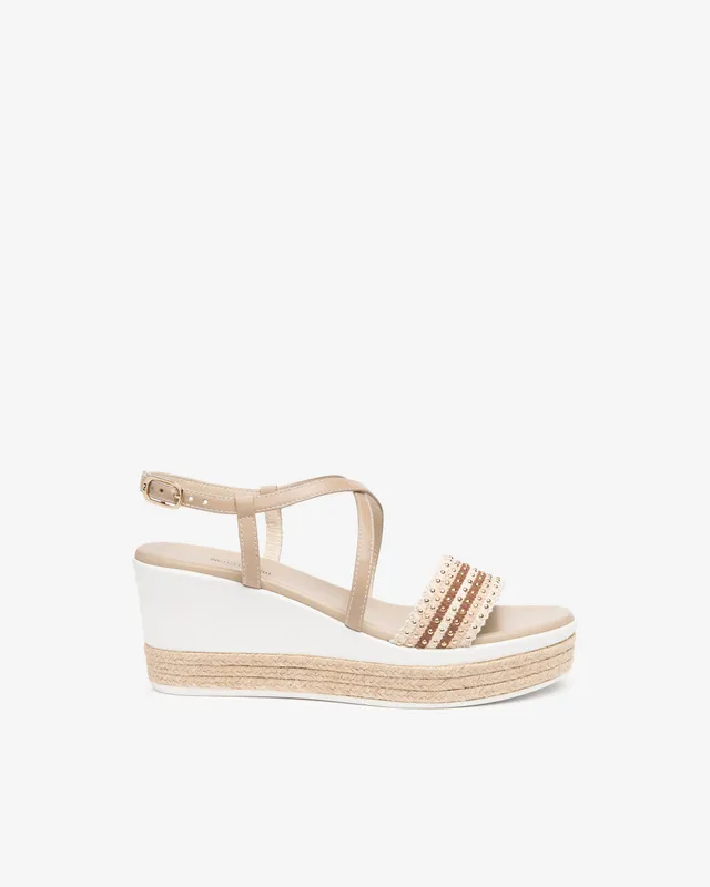 Nero Giardini Sandals cuir compensée cloutée femme